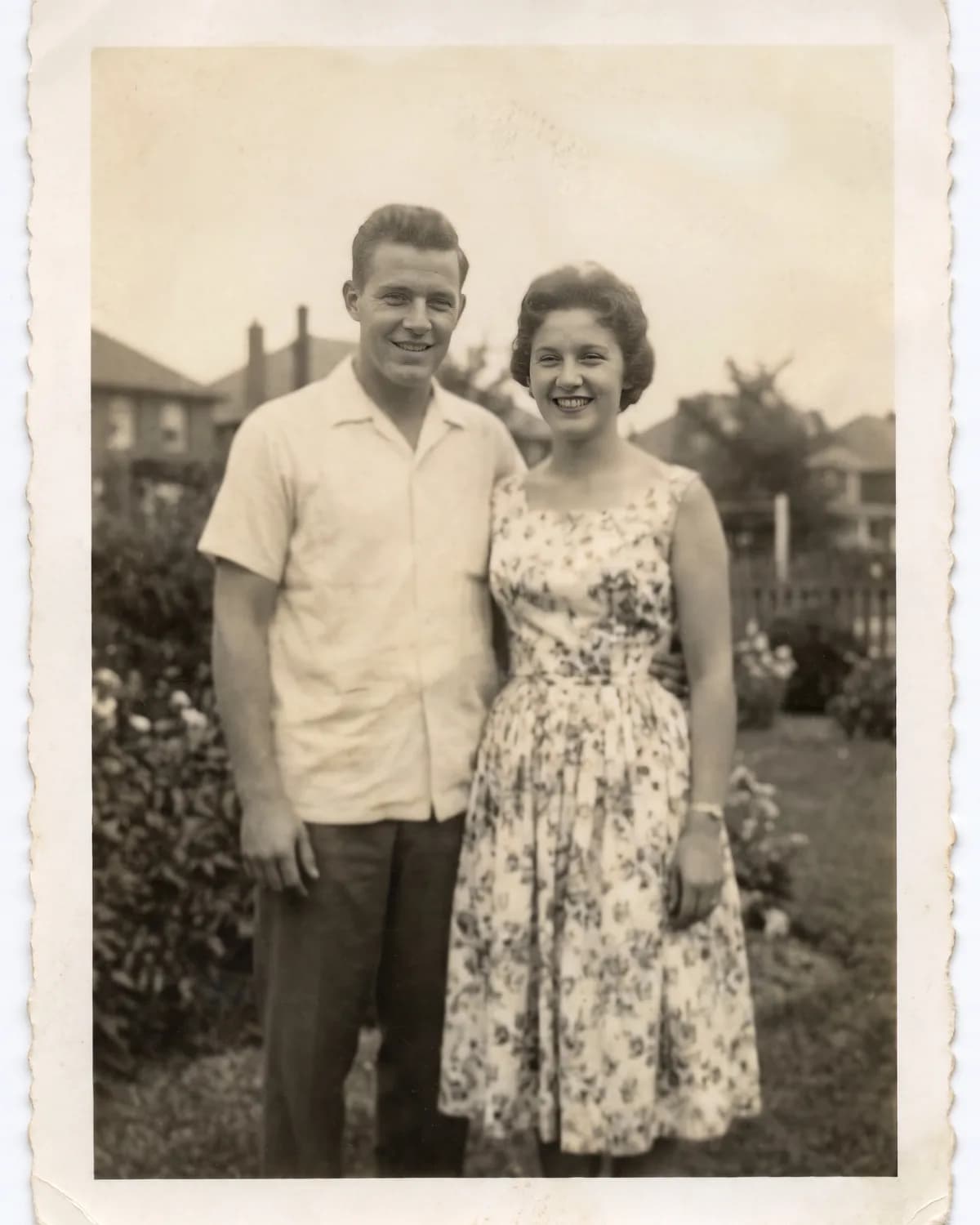 The same photograph with both faces recovered from the soft original scan